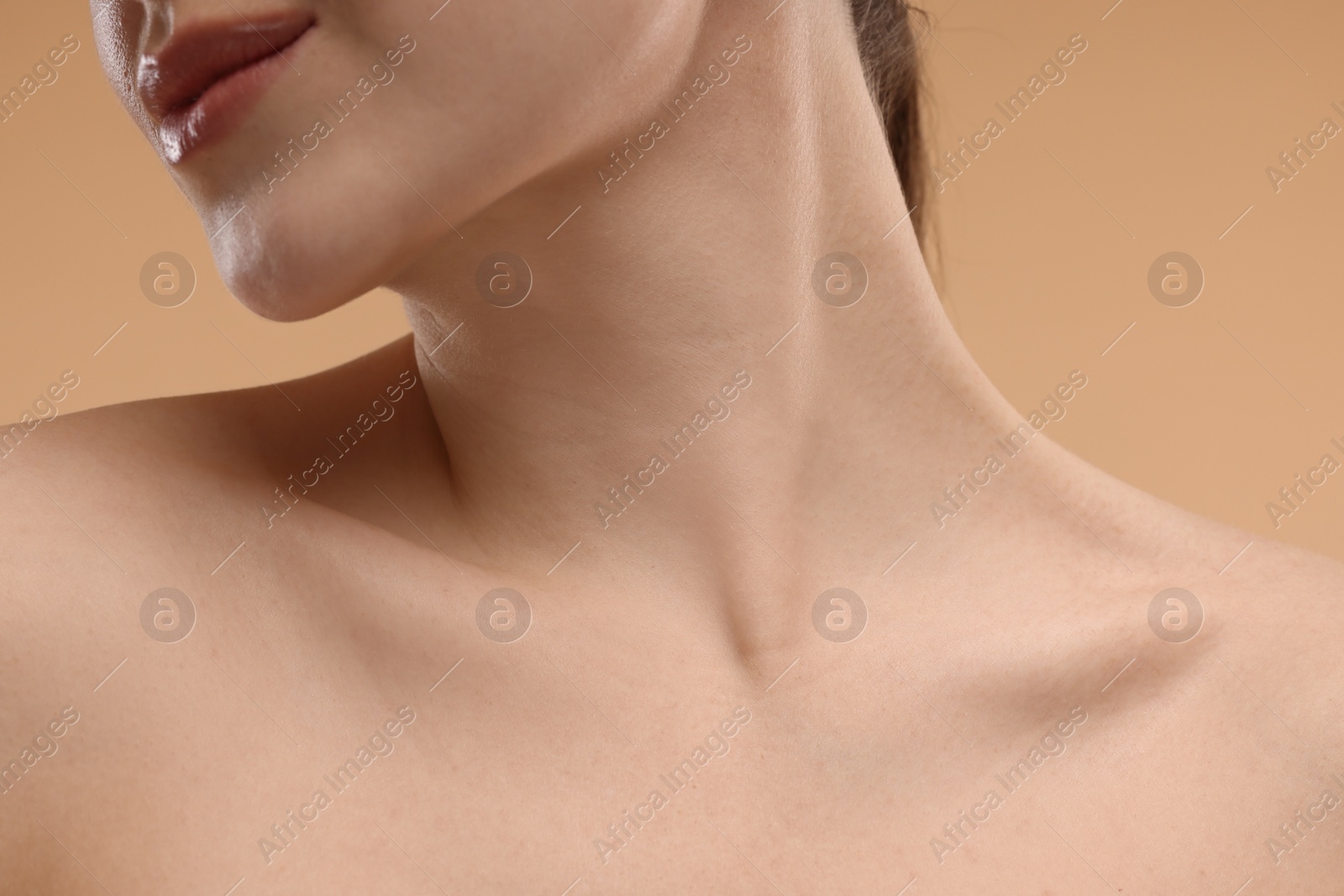 Photo of Beauty concept. Woman on beige background, closeup