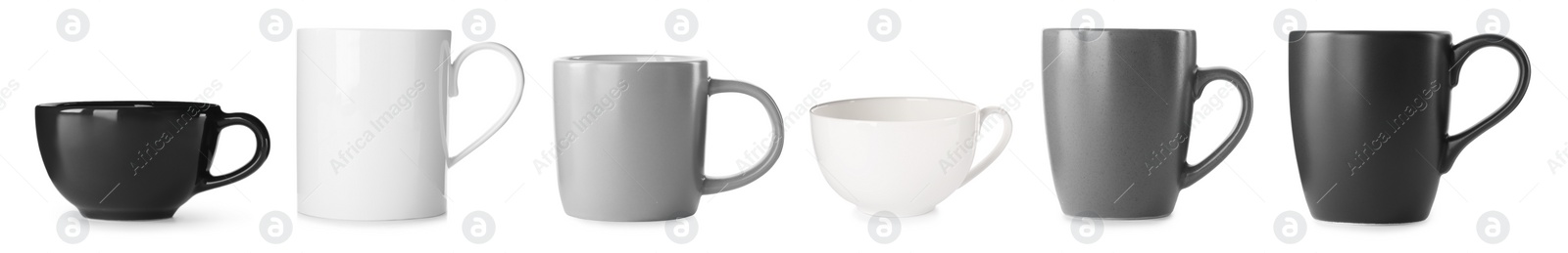 Image of Set with different beautiful cups on white background. Banner design