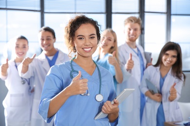 Photo of Smart medical student with her classmates in college