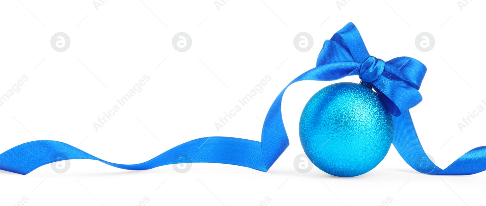 Photo of Beautiful light blue Christmas ball with ribbon isolated on white