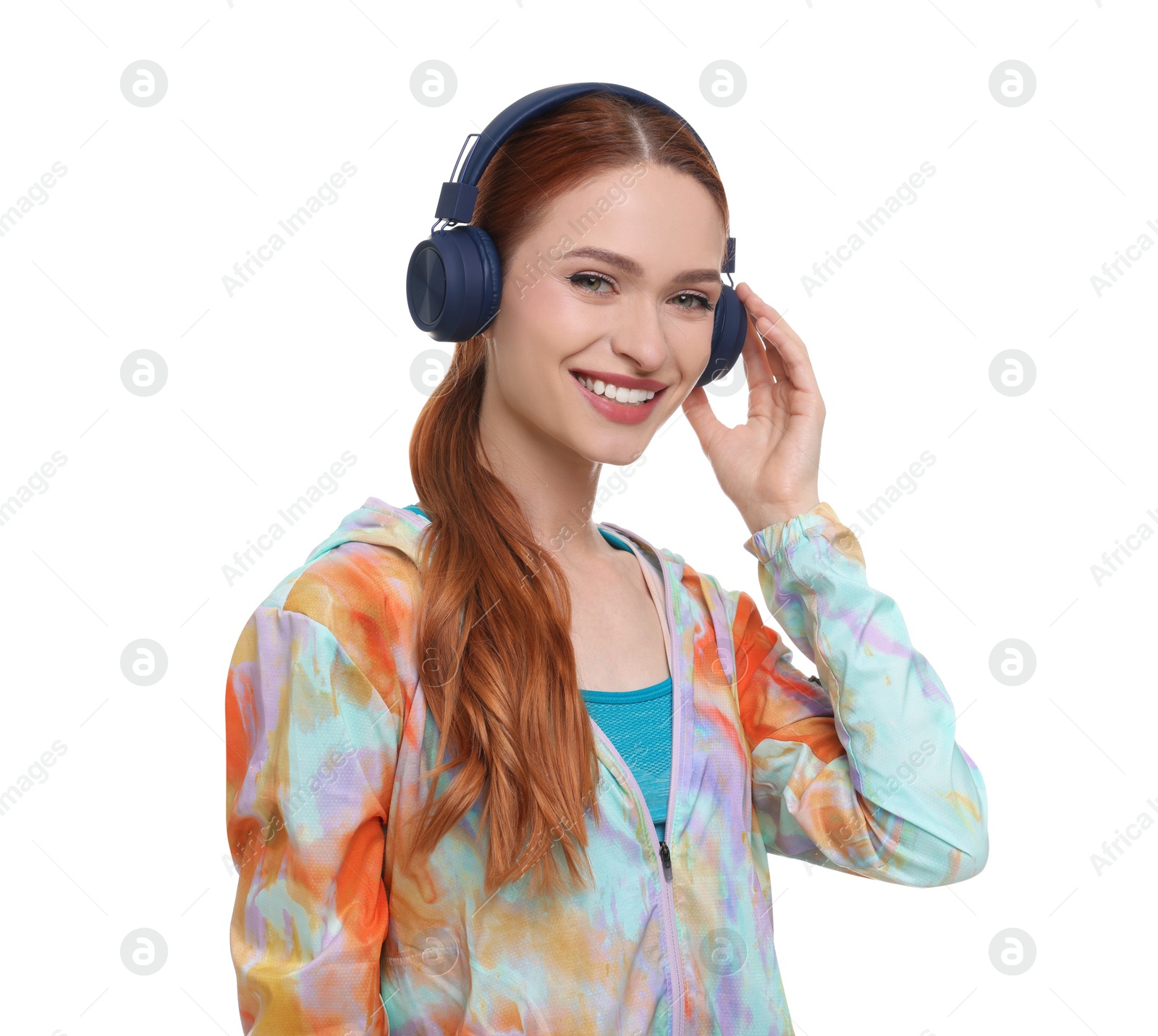 Photo of Young woman in sportswear and headphones on white background