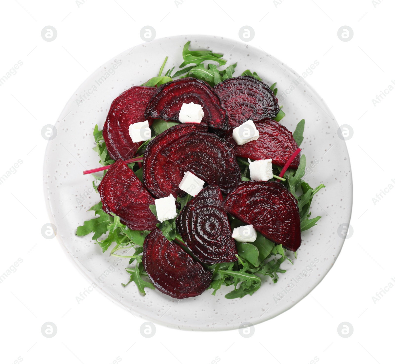 Photo of Roasted beetroot slices with feta cheese and arugula isolated on white, top view