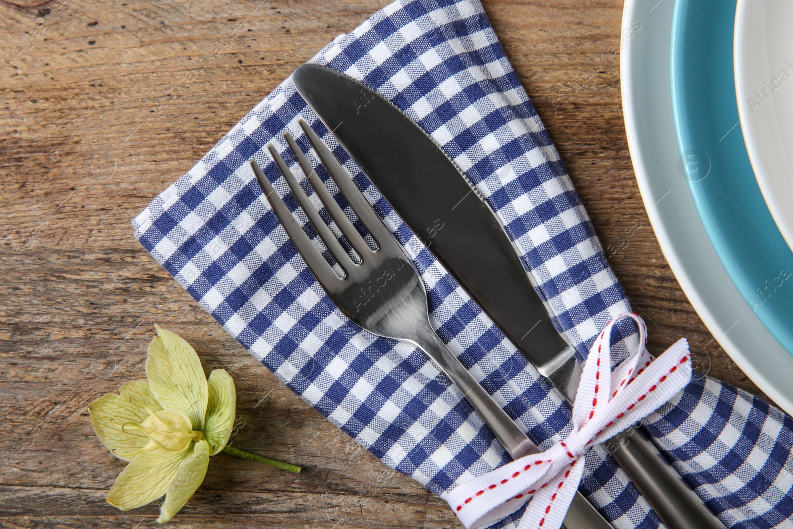 Photo of Beautiful table setting on wooden background, flat lay