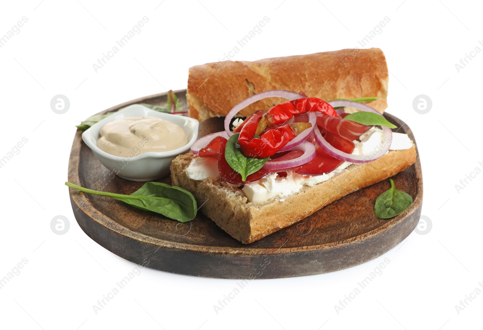 Photo of Delicious sandwich with bresaola, cream cheese, chili pepper and sauce isolated on white