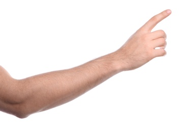 Man pointing at something on white background, closeup of hand