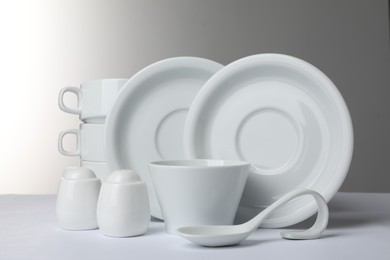 Set of clean dishware isolated on white