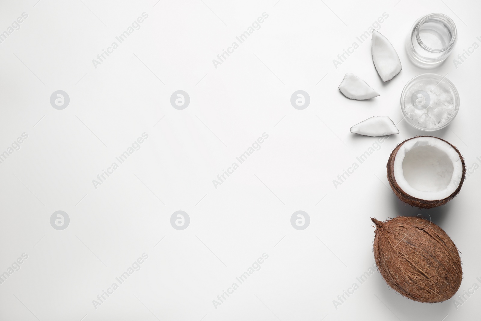 Photo of Composition with coconut oil on white background, top view