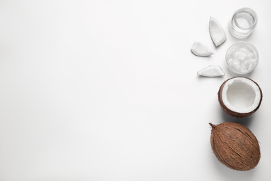 Composition with coconut oil on white background, top view