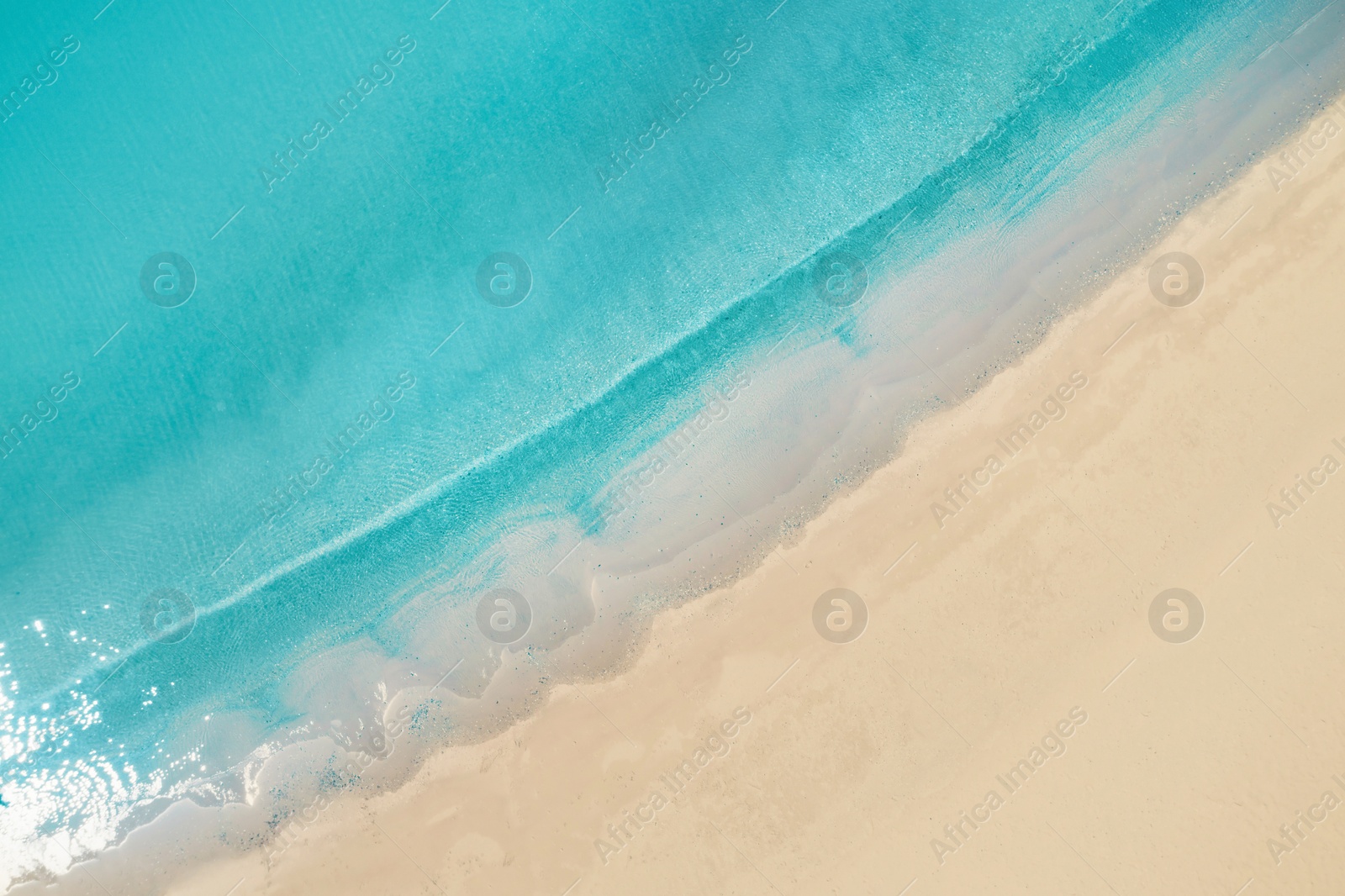 Image of Beautiful sandy beach and sea, top view