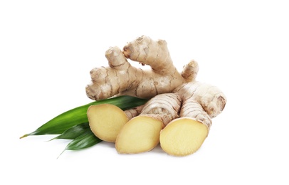 Photo of Cut fresh ginger and leaves isolated on white