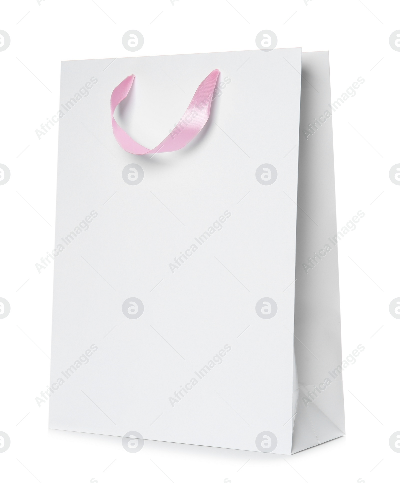 Photo of Paper shopping bag isolated on white. Mock up for design