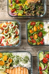 Healthy meal. Containers with different products on wooden table, flat lay