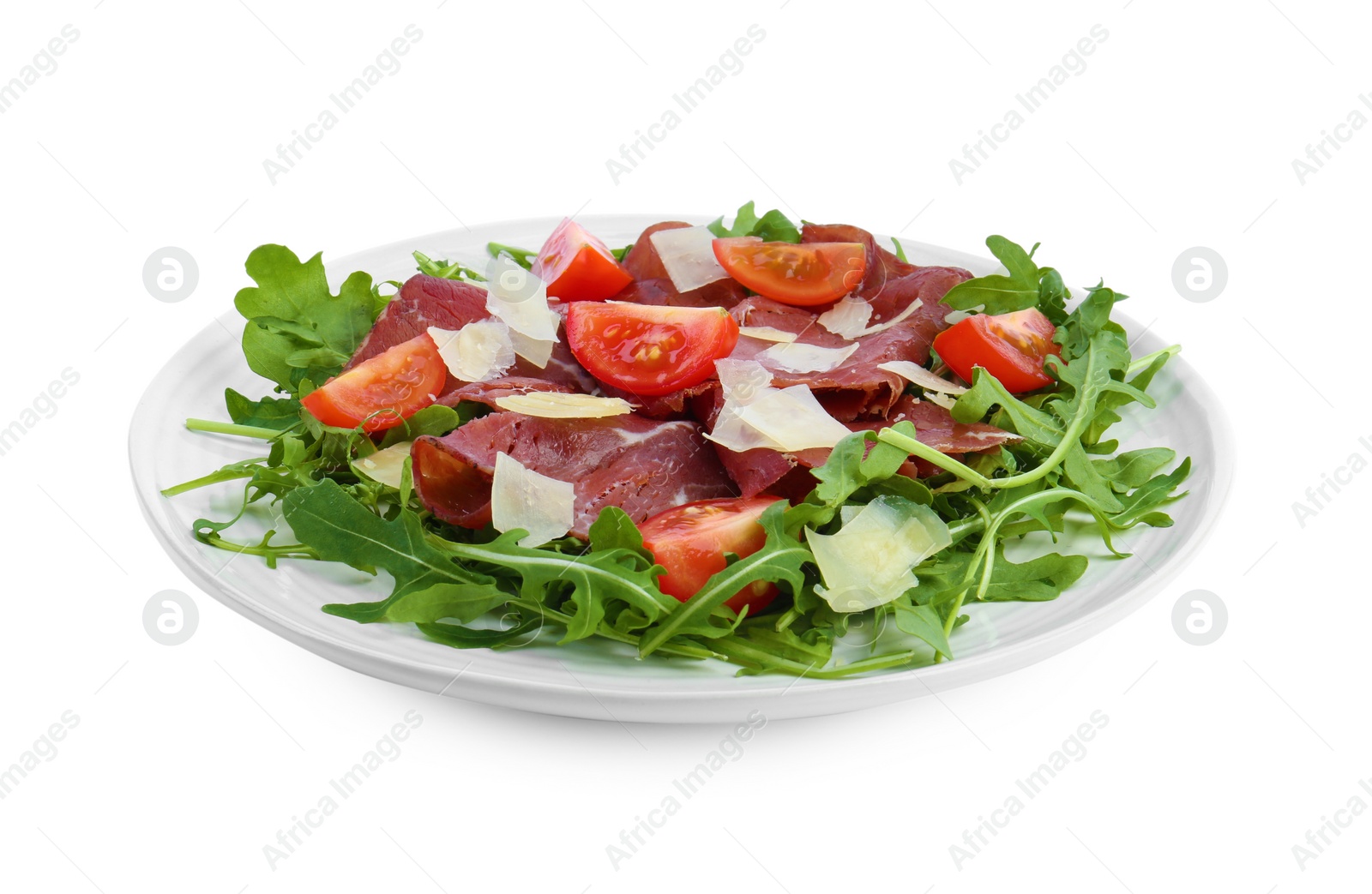 Photo of Delicious bresaola salad with parmesan cheese isolated on white