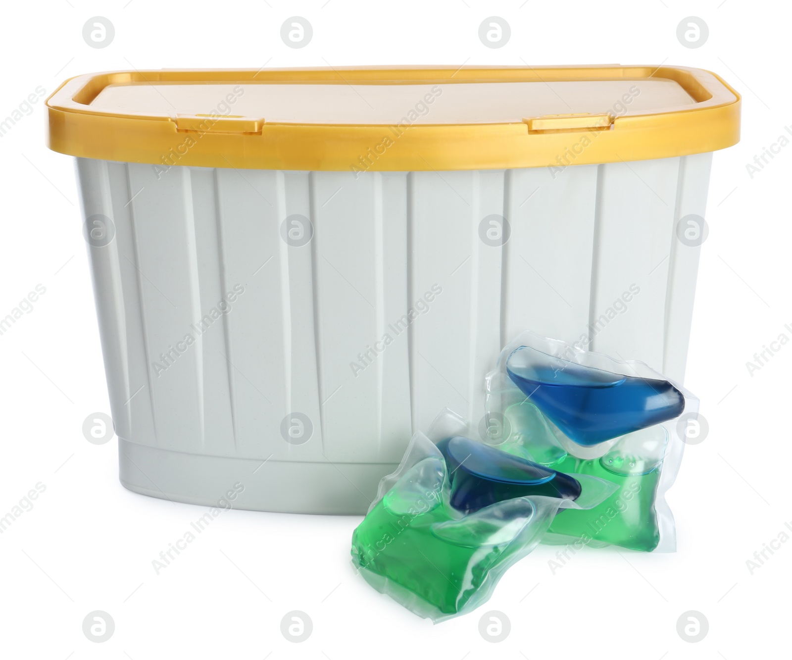 Photo of Laundry capsules and box on white background