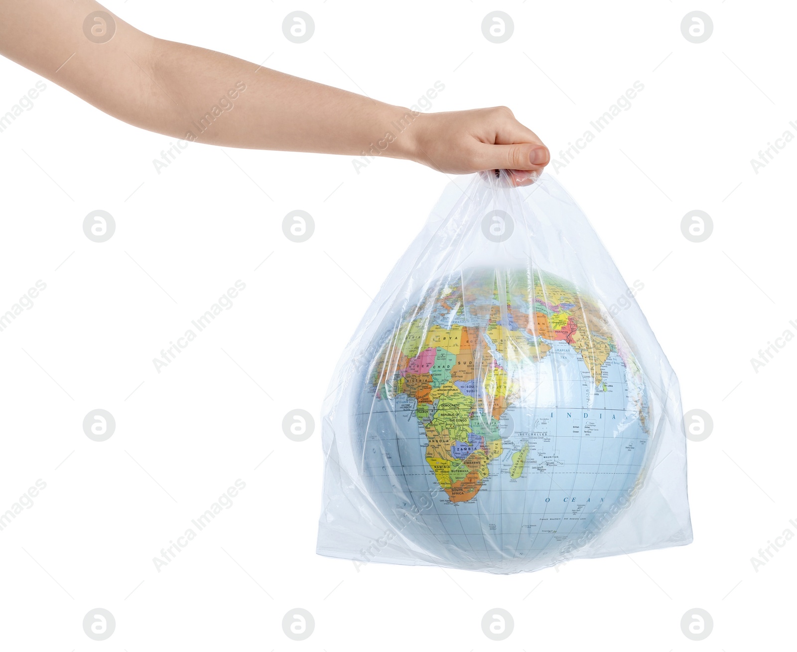 Photo of Woman holding globe in plastic bag on white background, closeup. Environmental protection concept