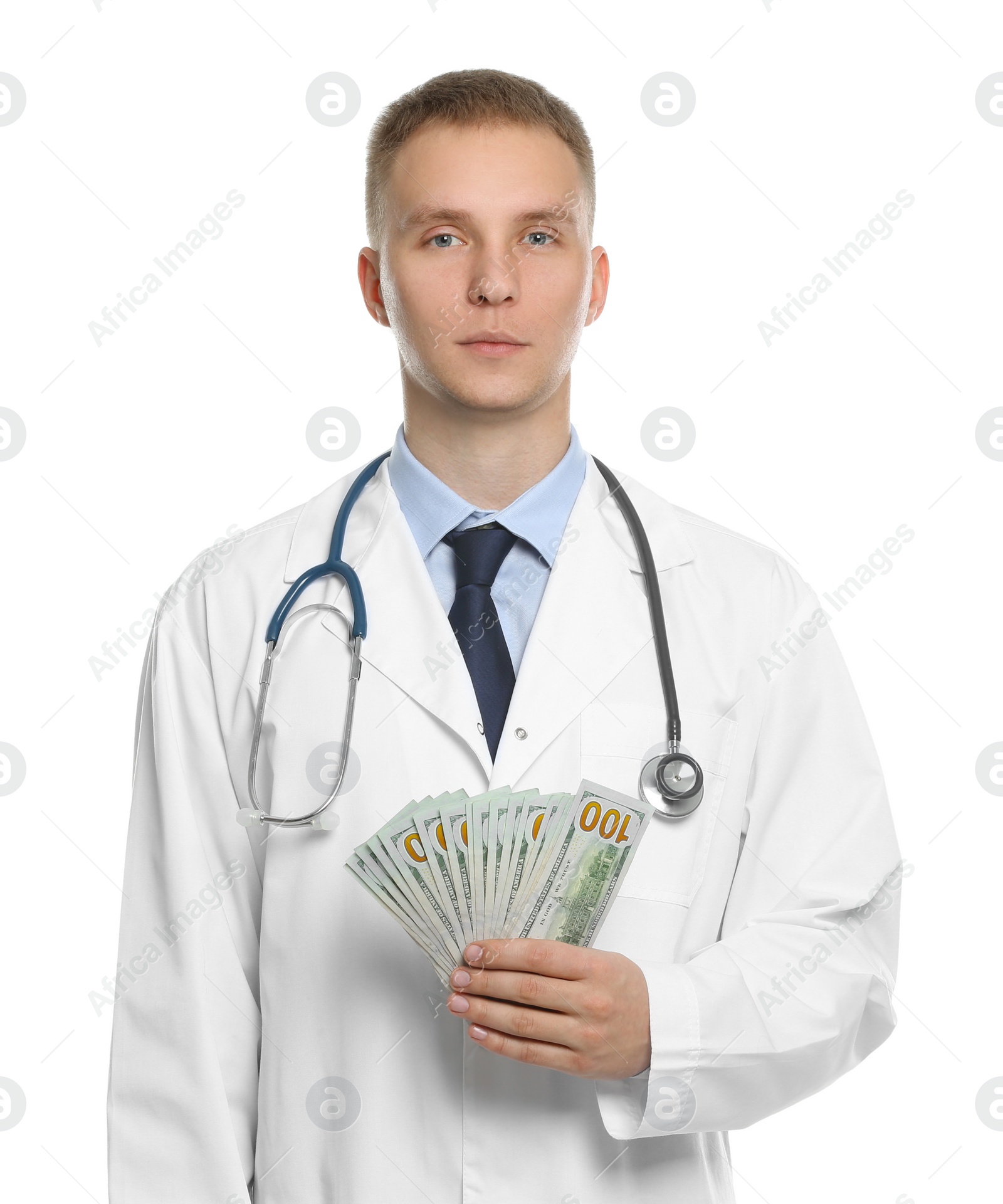 Photo of Doctor with bribe on white background. Corruption in medicine