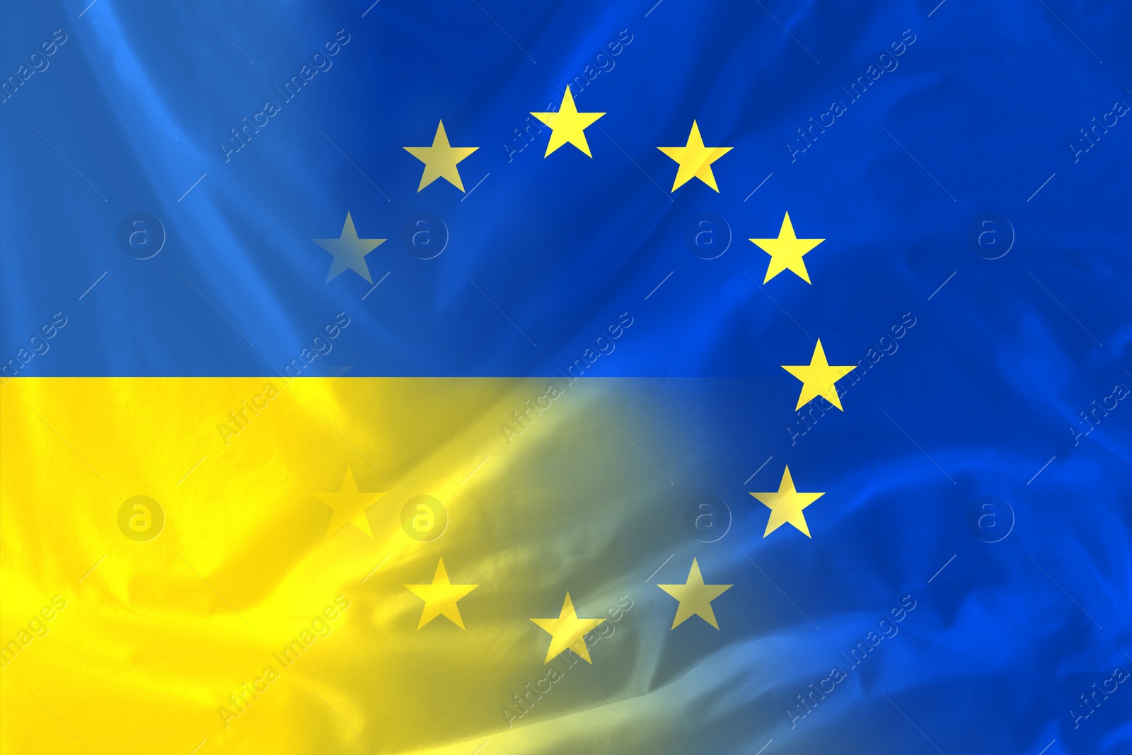 Image of Flags of Ukraine and European Union, double exposure. International diplomatic relationships