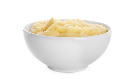 Photo of Bowl with mashed potatoes on white background