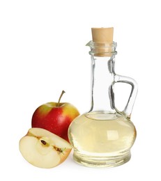 Natural apple vinegar and fresh fruits on white background