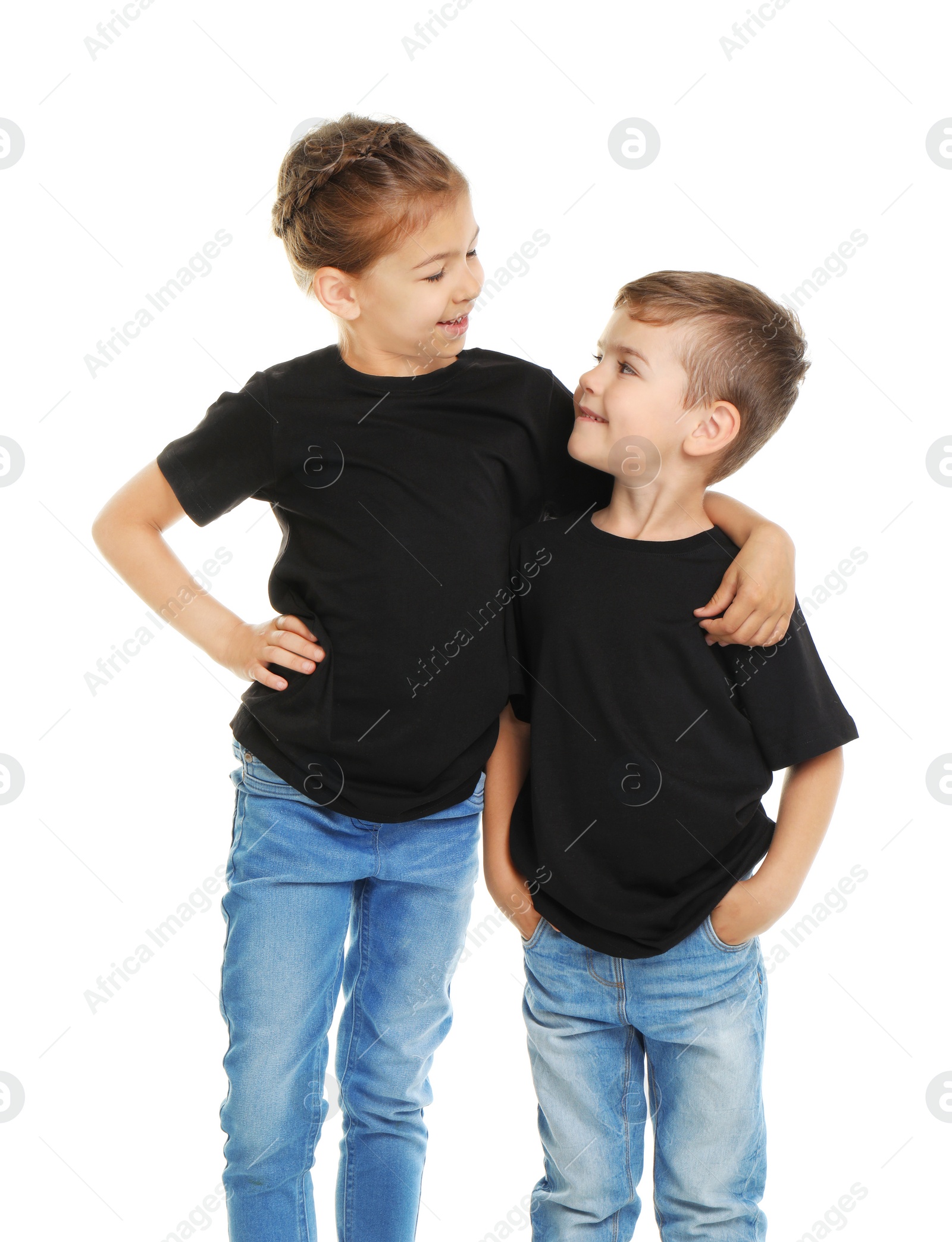 Photo of Little kids in t-shirts on white background. Mockup for design