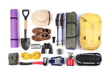 Photo of Set of camping equipment on white background, top view. Packing for trip