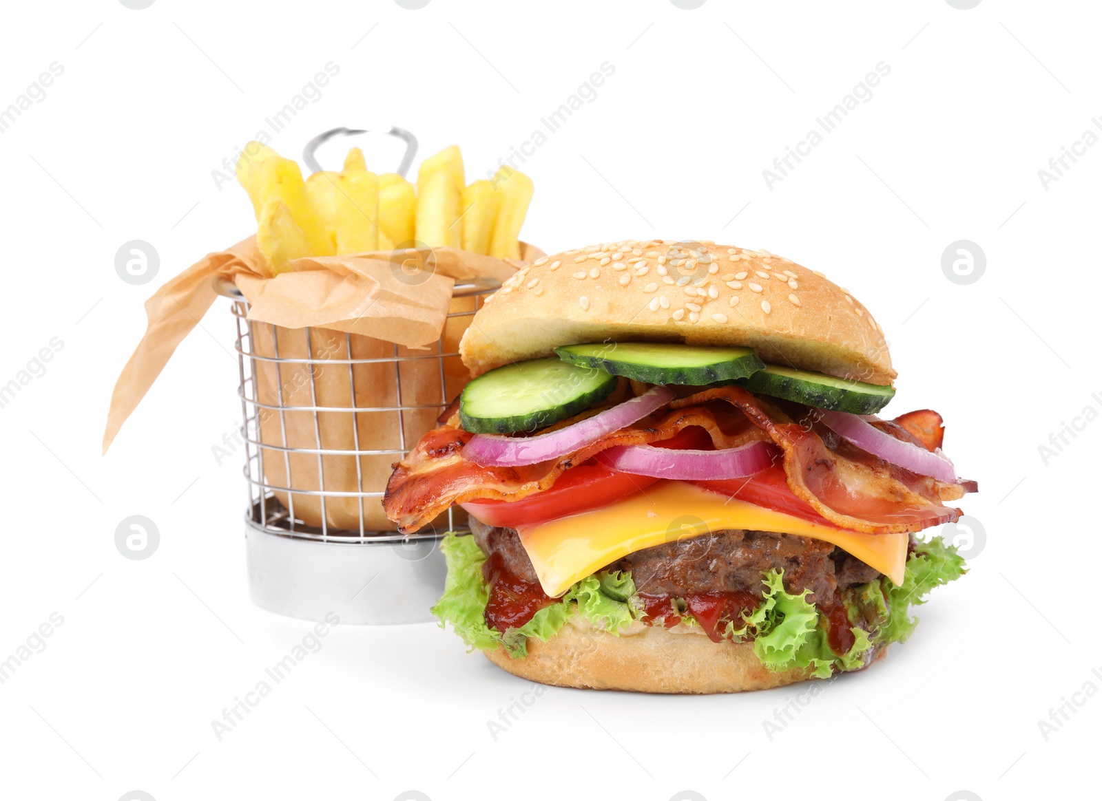 Photo of Tasty burger with bacon, vegetables and patty served with french fries isolated on white