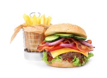 Photo of Tasty burger with bacon, vegetables and patty served with french fries isolated on white