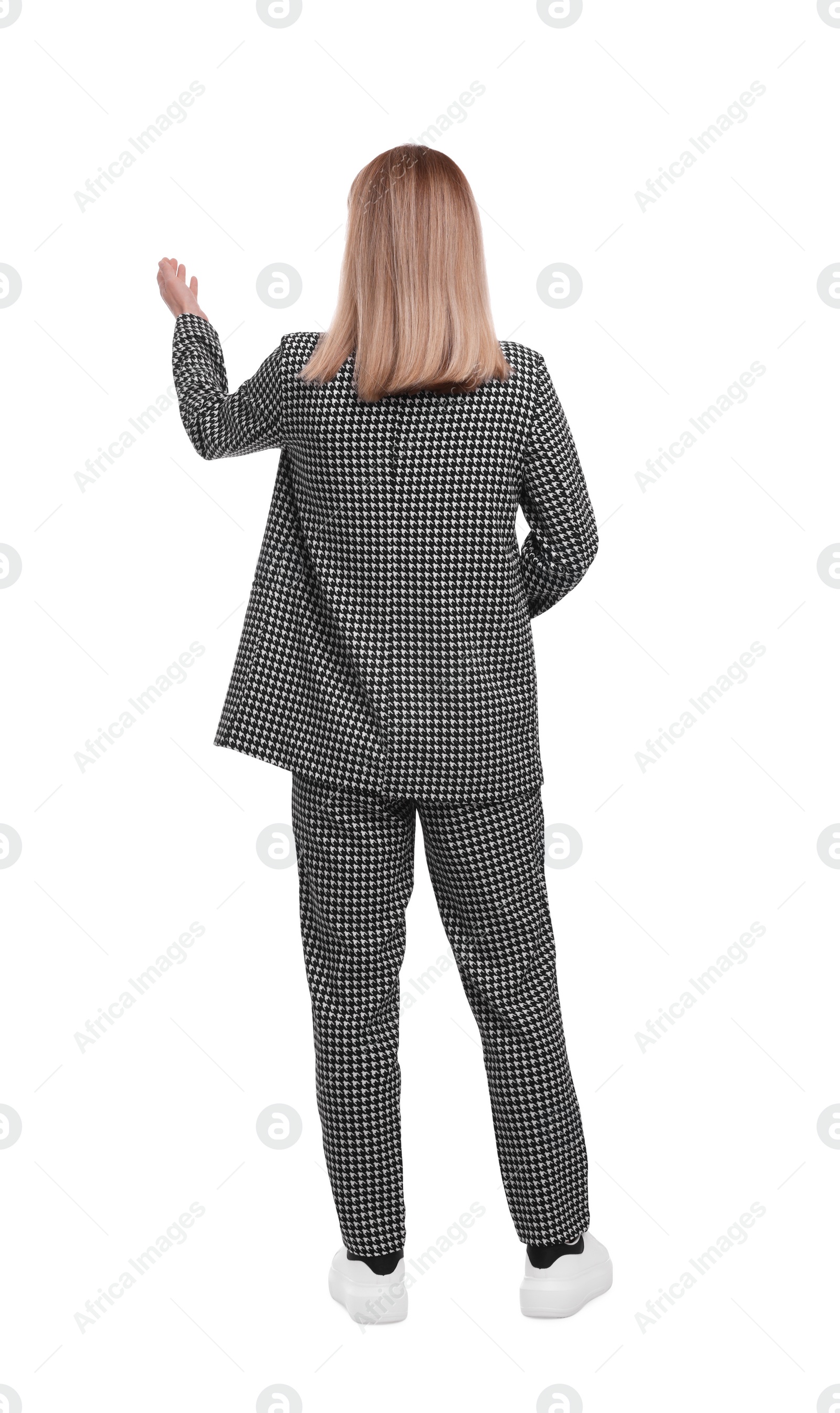 Photo of Businesswoman in suit on white background, back view