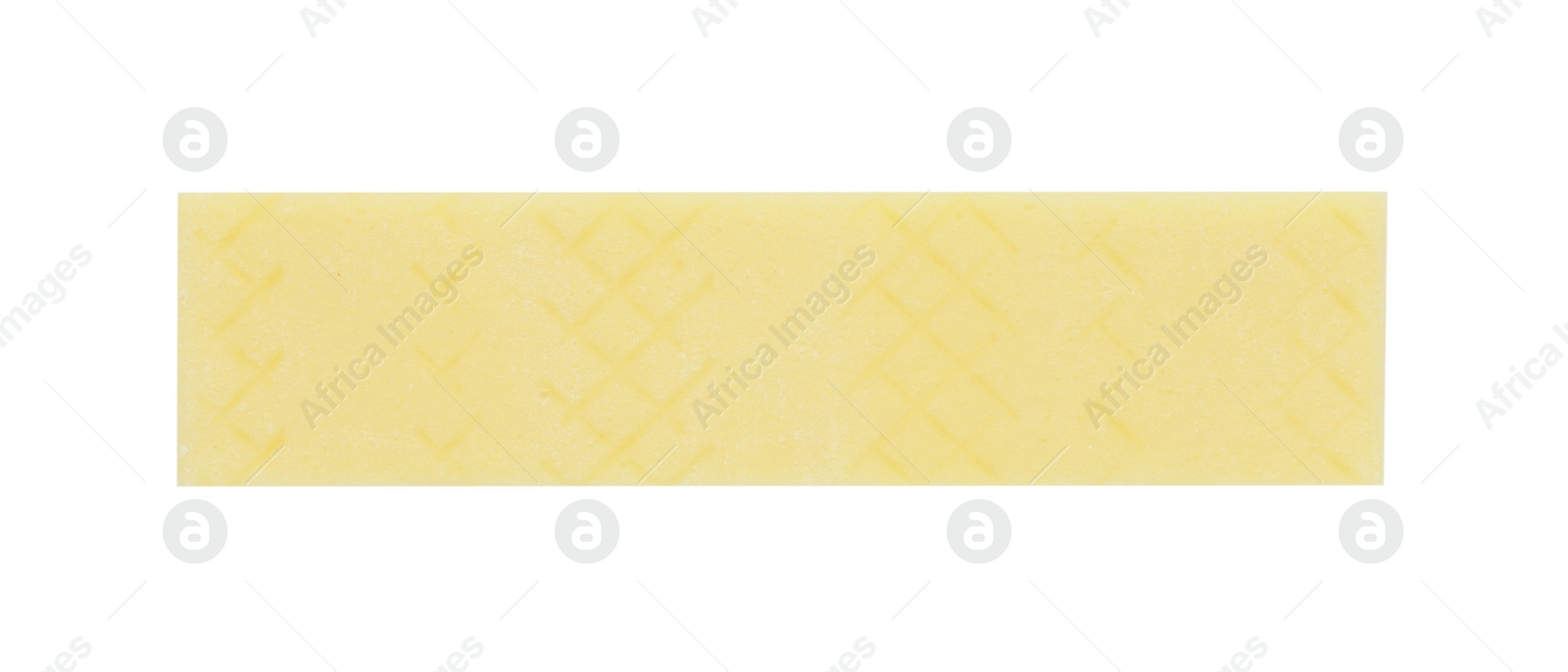 Photo of Stick of tasty yellow bubble gum isolated on white, top view