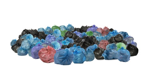 Image of Big heap of trash bags with garbage on white background