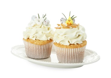 Photo of Tasty Easter cupcakes with vanilla cream isolated on white