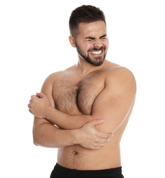 Man suffering from elbow pain on white background