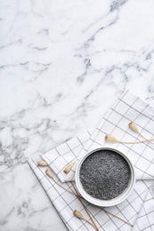 Photo of Flat lay composition with poppy seeds on marble background