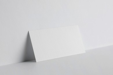 Blank business card on white background. Mockup for design