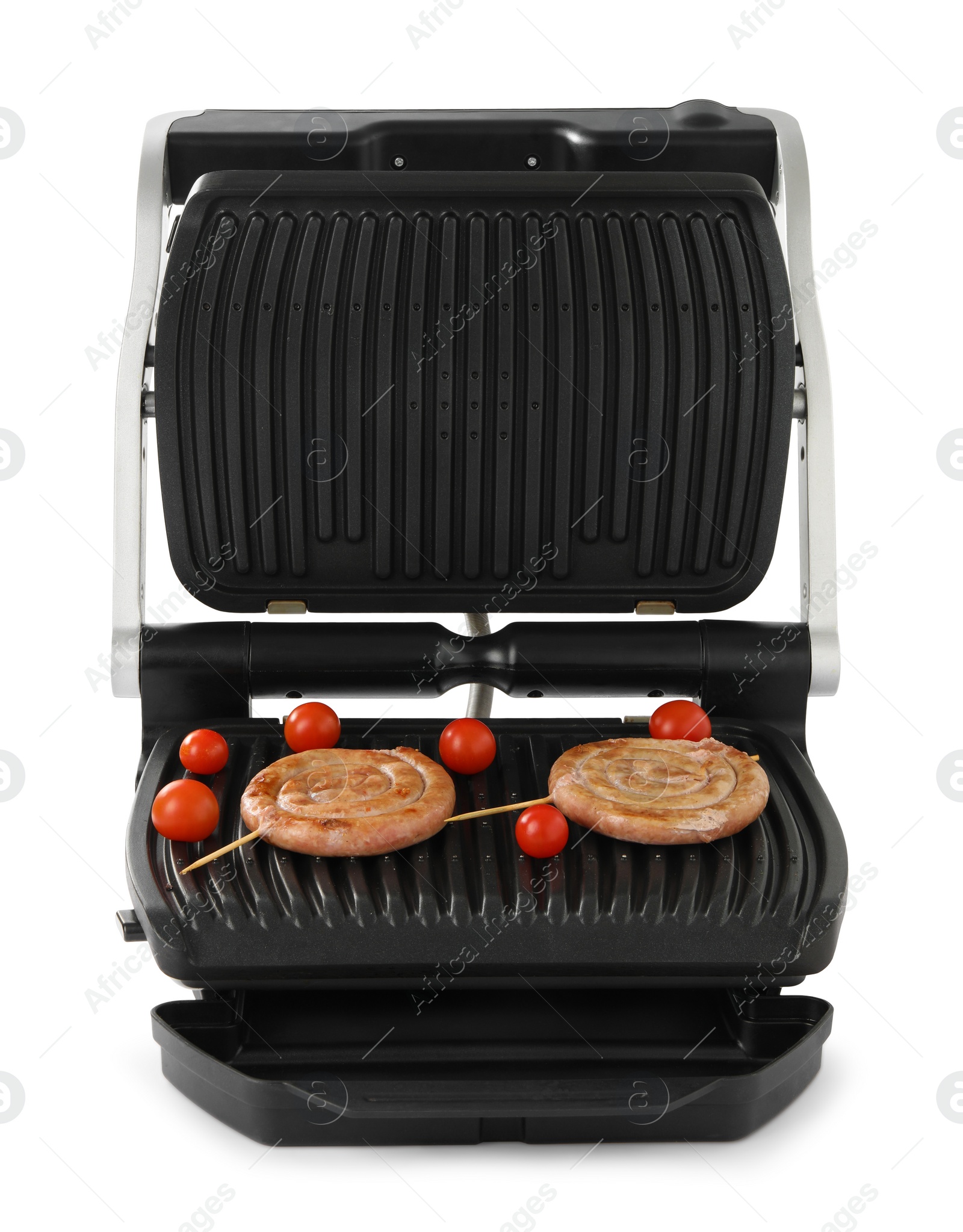 Photo of Electric grill with homemade sausages and fresh tomatoes isolated on white