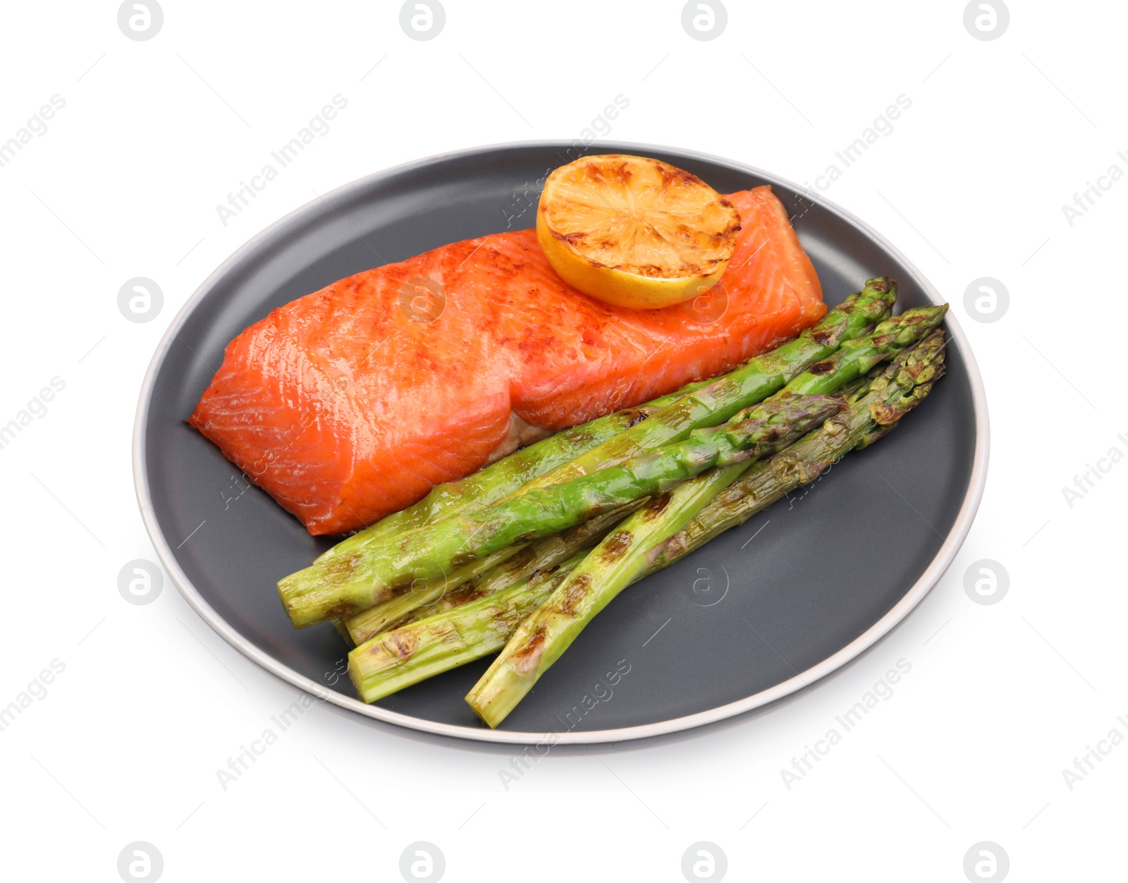 Photo of Tasty grilled salmon with asparagus and lemon isolated on white