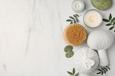 Photo of Flat lay composition with different spa products on white marble table. Space for text