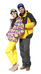 Couple wearing stylish winter sport clothes on white background