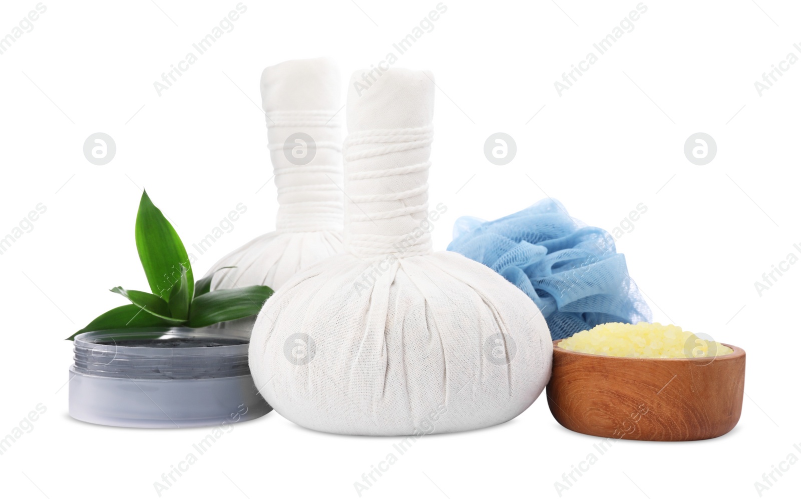 Photo of Herbal massage bags, sea salt, cosmetic product on white background. Spa supply