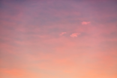 Photo of Picturesque view of beautiful sky lit by setting sun