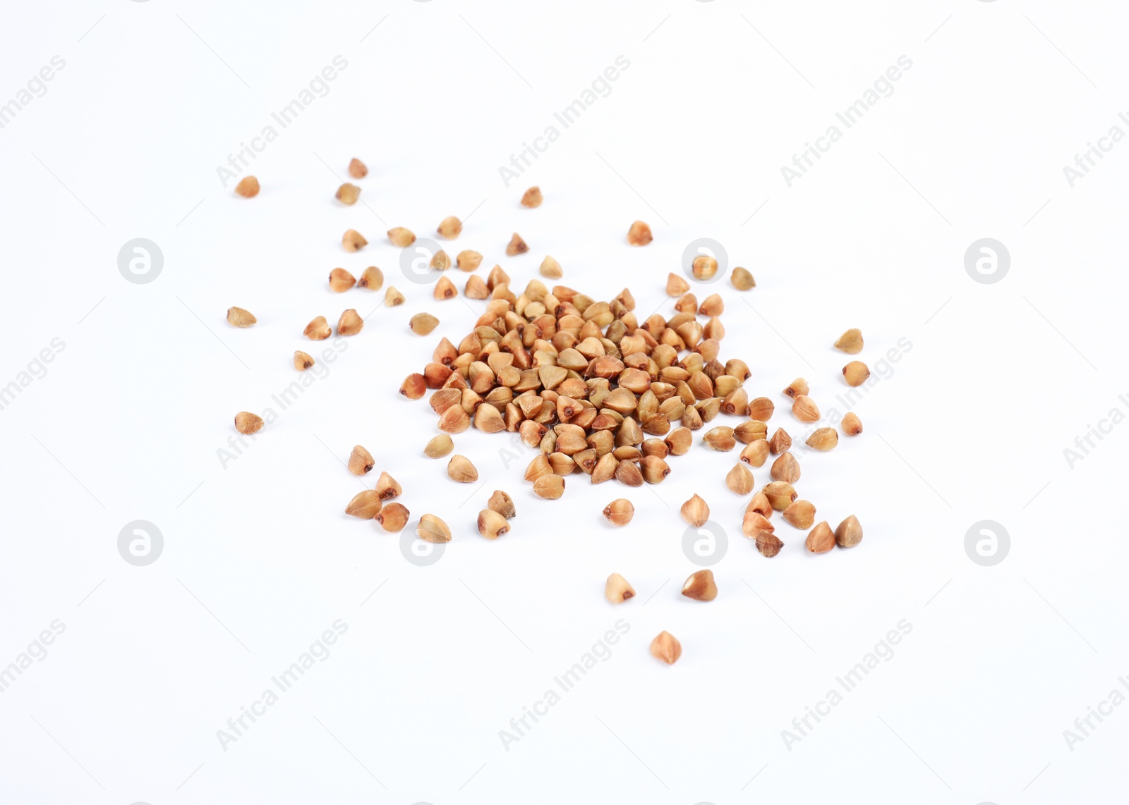 Photo of Uncooked buckwheat on white background. Healthy diet