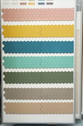 Samples of tile colors display in store