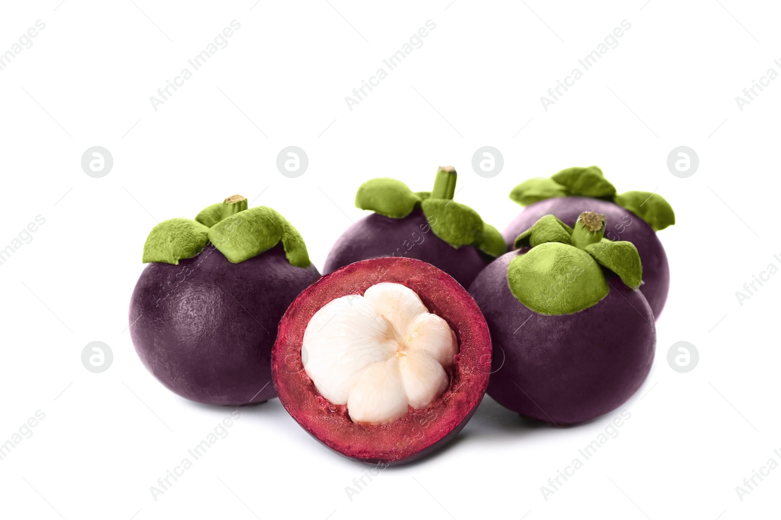 Photo of Fresh ripe mangosteen fruits on white background