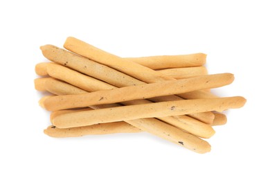 Fresh delicious grissini sticks on white background, top view