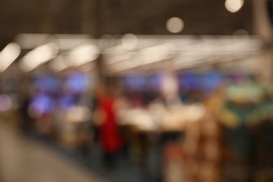 Photo of Blurred view of stylish modern cafe interior