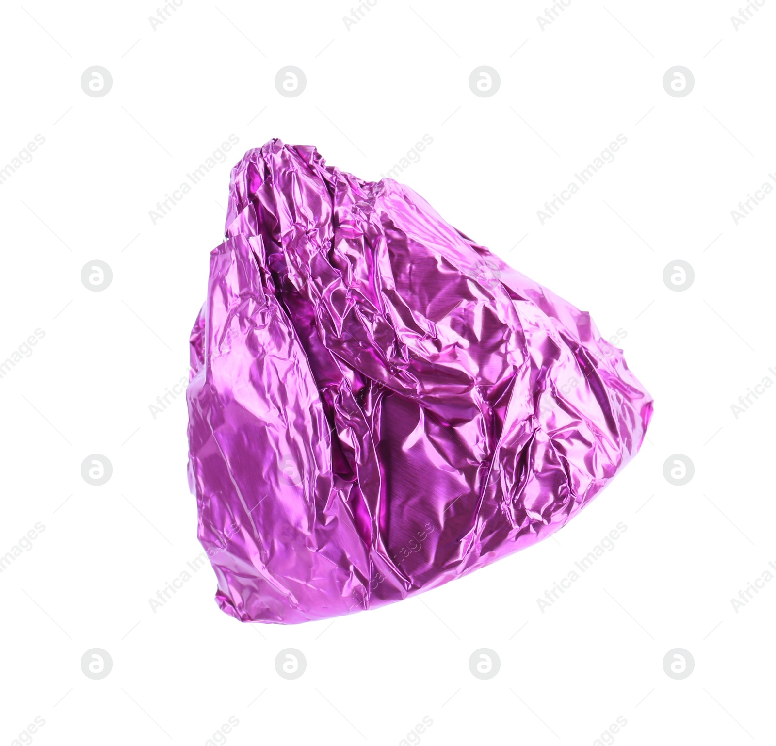 Photo of Tasty candy in violet wrapper isolated on white