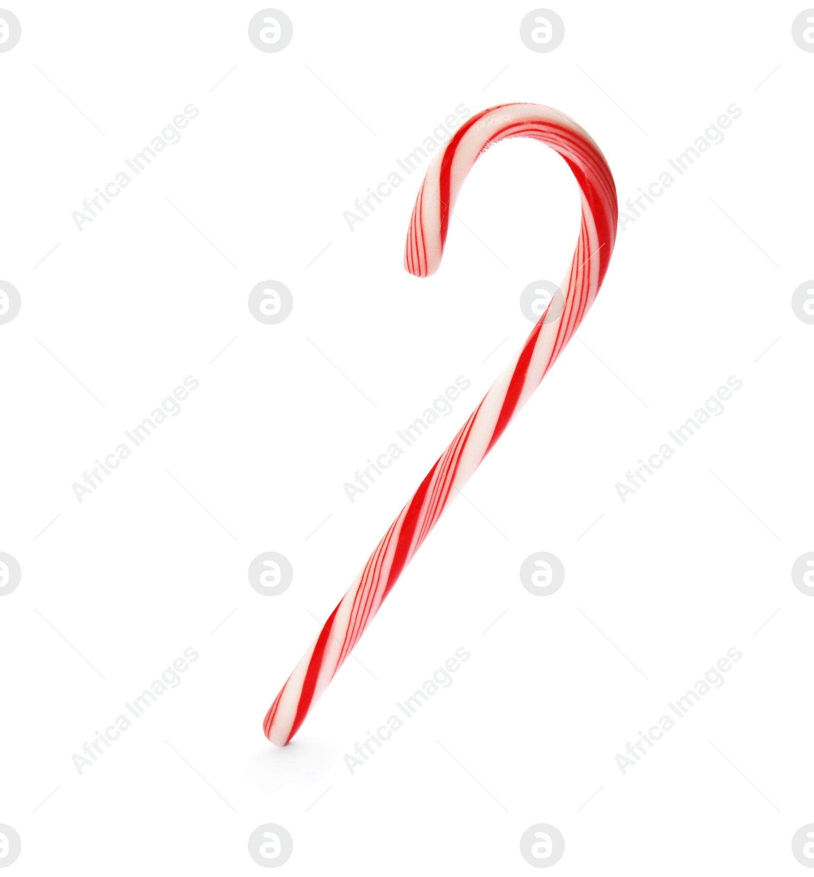 Photo of Tasty candy cane on white background. Festive treat