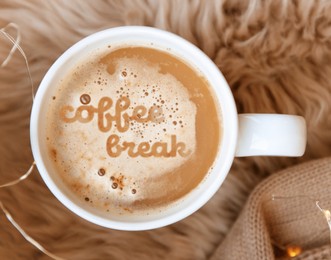Image of Cup of aromatic americano with milk and phrase Coffee Break, top view  