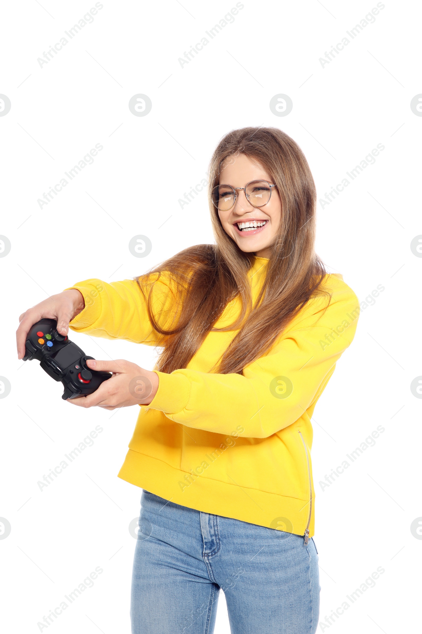 Photo of Emotional young woman playing video games with controller isolated on white