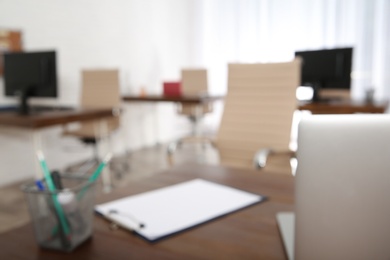 Photo of Modern brightly lit office with bokeh effect